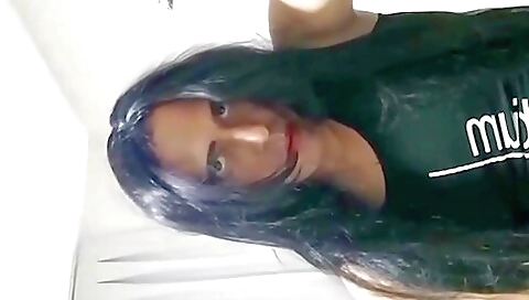 Beautiful brunette lady is giving herself a good time