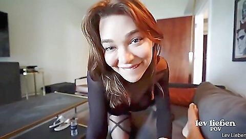 A blonde with big tits is having a hard anal handjob