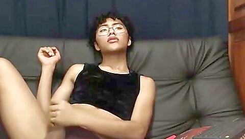 Amateur brunette with curly hair in a sexy blouse and white dress