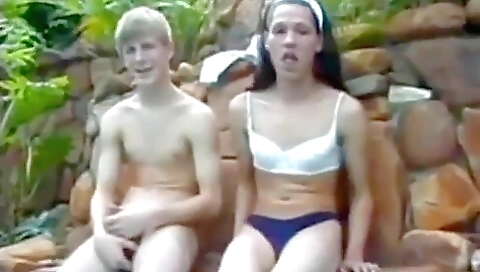 An erotic video with a vintage babe in a red dress