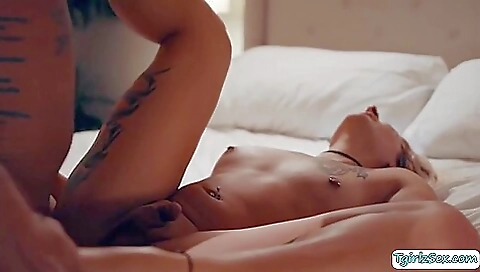 Blonde shemale with tattooed pussy gets a dick in her pussy