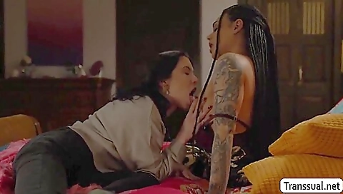 A brunette with a tattoo on her ass gets fucked in her ass